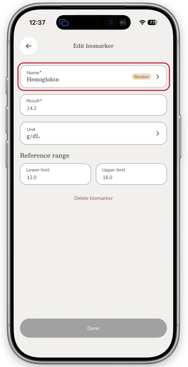 The mobile biomarker review screen showing a biomarker marked Review.